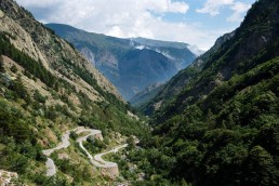 Limited edition fine art cycling print of two cyclists climbing Col de la Lombarde. Shot for Cyclist Magazine by Patrik Lundin - cycling prints, fine art cycling print, limited edition prints, limited edition cycling prints, cycling photos, cycling images, cyclist, hairpin, hairpin road, cycling, cyclist magazine, gift, gift for cyclists