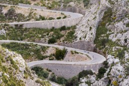 Limited edition fine art cycling print of three cyclists climbing Sa Calobra in Majorca. Shot for Cyclist Magazine by Patrik Lundin - cycling prints, fine art cycling print, limited edition prints, limited edition cycling prints, cycling photos, cycling images, cyclist, hairpin, hairpin road, cycling, cyclist magazine, gift, gift for cyclists