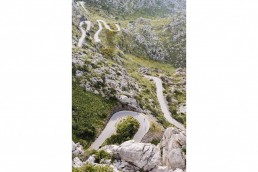 Limited edition fine art cycling print of three cyclists climbing Sa Calobra in Majorca. Shot for Cyclist Magazine by Patrik Lundin - cycling prints, fine art cycling print, limited edition prints, limited edition cycling prints, cycling photos, cycling images, cyclist, hairpin, hairpin road, cycling, cyclist magazine, gift, gift for cyclists