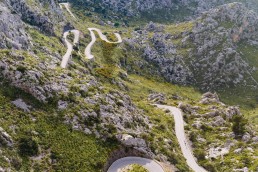 Limited edition fine art cycling print of three cyclists climbing Sa Calobra in Majorca. Shot for Cyclist Magazine by Patrik Lundin - cycling prints, fine art cycling print, limited edition prints, limited edition cycling prints, cycling photos, cycling images, cyclist, hairpin, hairpin road, cycling, cyclist magazine, gift, gift for cyclists