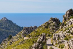 Limited edition fine art cycling print of three cyclists climbing Sa Calobra in Majorca. Shot for Cyclist Magazine by Patrik Lundin - cycling prints, fine art cycling print, limited edition prints, limited edition cycling prints, cycling photos, cycling images, cyclist, hairpin, hairpin road, cycling, cyclist magazine, gift, gift for cyclists
