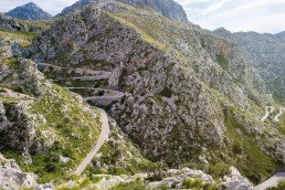 Limited edition fine art cycling print of three cyclists climbing Sa Calobra in Majorca. Shot for Cyclist Magazine by Patrik Lundin - cycling prints, fine art cycling print, limited edition prints, limited edition cycling prints, cycling photos, cycling images, cyclist, hairpin, hairpin road, cycling, cyclist magazine, gift, gift for cyclists