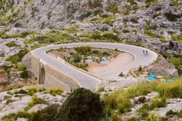 Limited edition fine art cycling print of three cyclists on top of Sa Calobra in Majorca. Shot for Cyclist Magazine by Patrik Lundin - cycling prints, fine art cycling print, limited edition prints, limited edition cycling prints, cycling photos, cycling images, cyclist, hairpin, hairpin road, cycling, cyclist magazine, gift, gift for cyclists