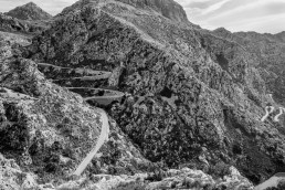 Limited edition fine art cycling print of three cyclists climbing Sa Calobra in Majorca. Shot for Cyclist Magazine by Patrik Lundin - cycling prints, fine art cycling print, limited edition prints, limited edition cycling prints, cycling photos, cycling images, cyclist, hairpin, hairpin road, cycling, cyclist magazine, gift, gift for cyclists