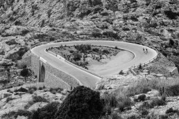 Limited edition fine art cycling print of three cyclist on top of Sa Calobra in Majorca. Shot for Cyclist Magazine by Patrik Lundin - cycling prints, fine art cycling print, limited edition prints, limited edition cycling prints, cycling photos, cycling images, cyclist, hairpin, hairpin road, cycling, cyclist magazine, gift, gift for cyclists